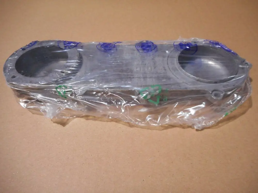 Gas/Luft Mischanschlussteil mit Verpackung, speziell für Remeha-Geräte, auf braunem Untergrund.